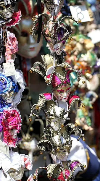 beautiful original Venetian masks handmade in a stand in piazza in venice