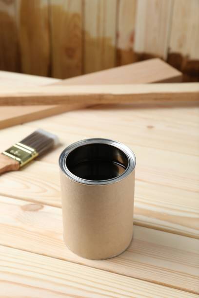 istock Can with wood stain on wooden surface. Space for text 1858339015
