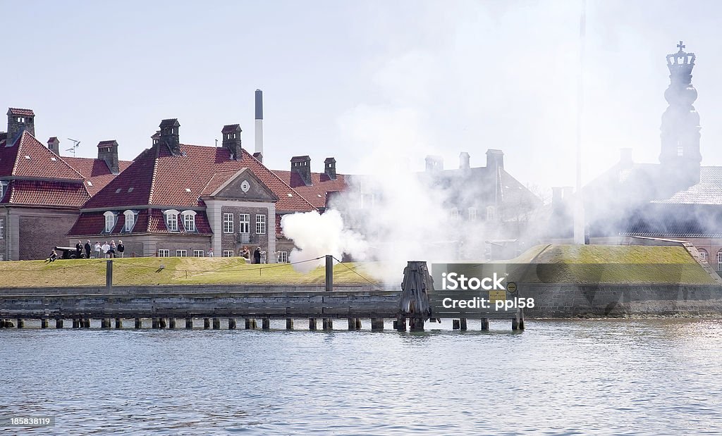 Salute in honor the Queen of Denmark Firing blank ammunition in honor the arrival Queen Margrethe II of Denmark on his yacht Architecture Stock Photo