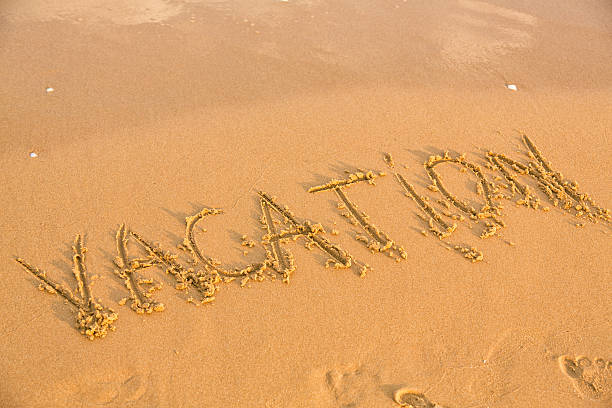 istock Word vacation on the yellow sandy beach 185838879