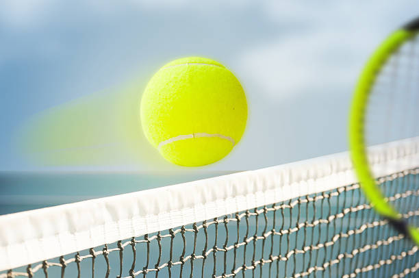istock Tennis Ball over Net 185839368
