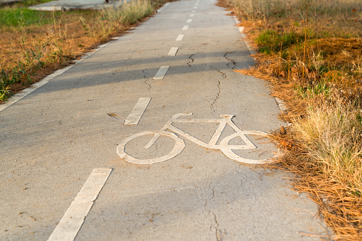 The asphalt road for bicycles.