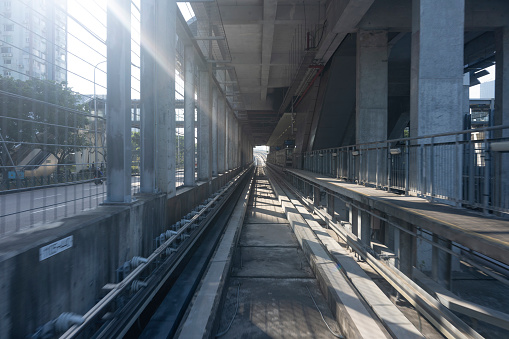 Inventory photos of modern urban high-speed trains stopping at tunnel entrance platforms