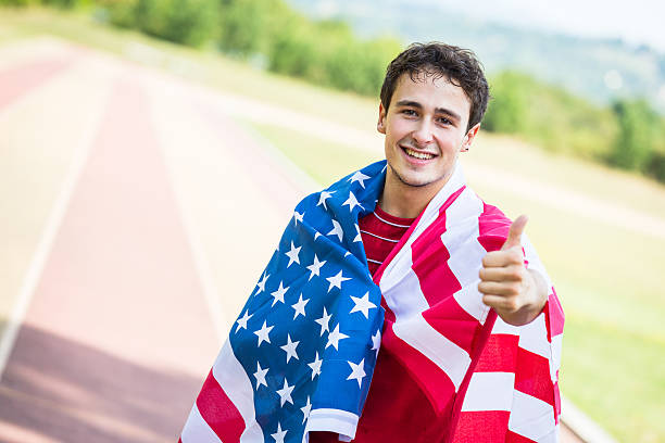 istock American Athlete with National Flag 185846028