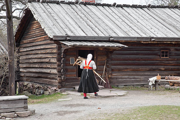 Ancient farmstead Woman takes away an economic inventory djurgarden photos stock pictures, royalty-free photos & images