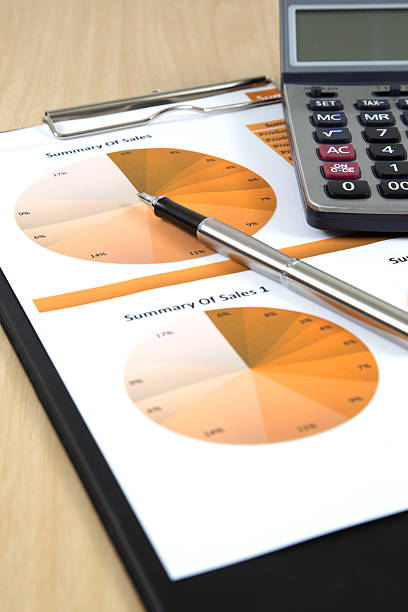 istock Graphs, charts, business report on table. 185846961