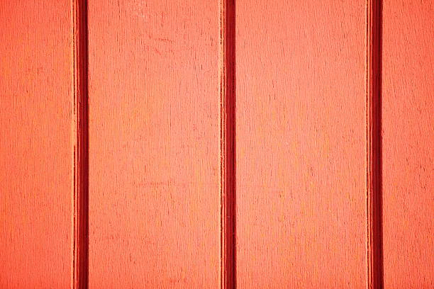 istock Wooden wall texture orange background 185847640