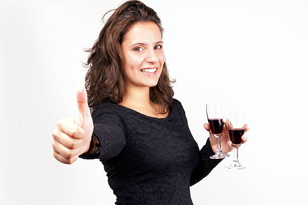 Thoughtful woman having wine in restaurant