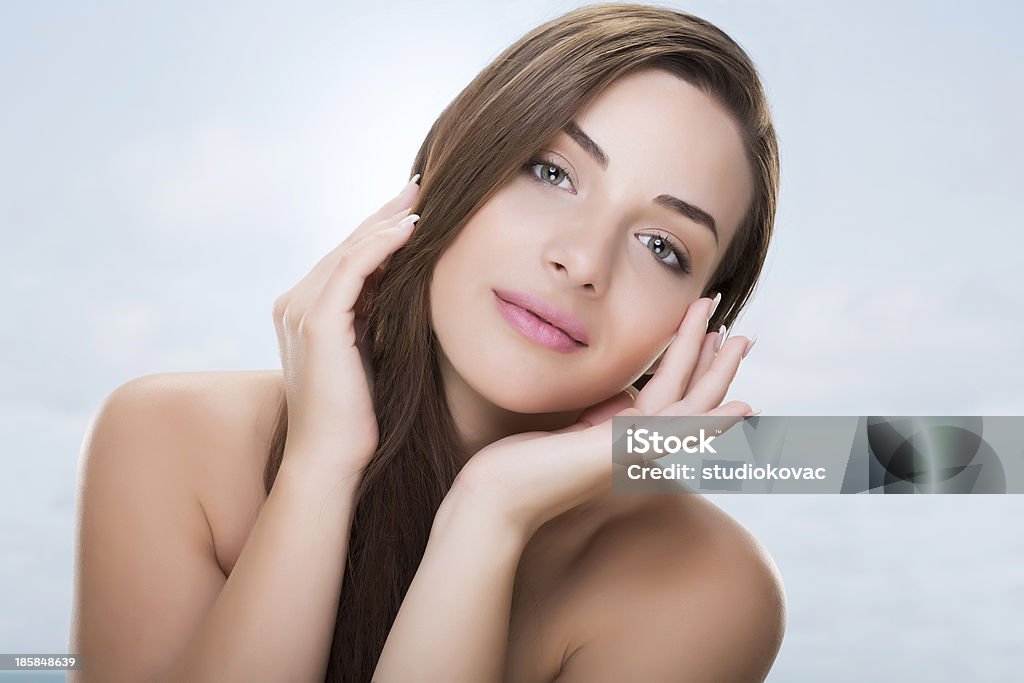 Beautiful young girl. Beautiful young girl with a head on the side. 16-17 Years Stock Photo