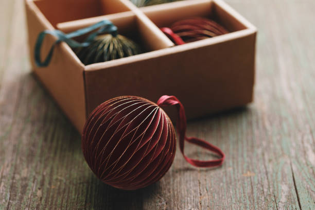 Handmade paper christmas ornaments in a box
