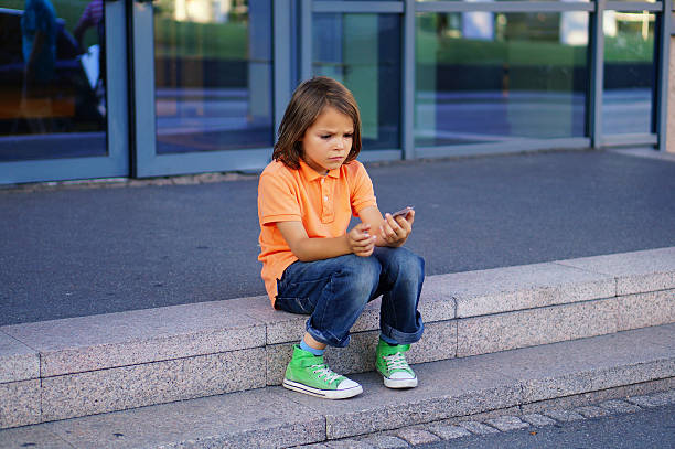 Thinking boy stock photo