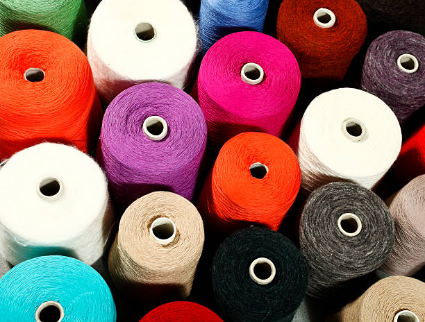 istock closeup of colorful threads 185851839