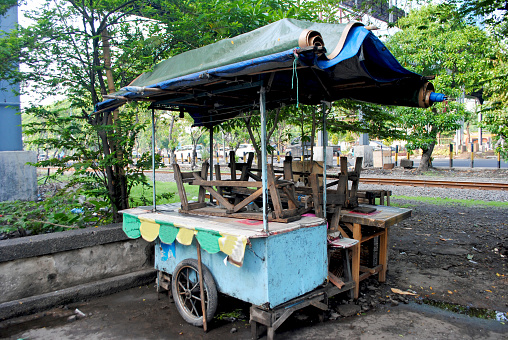 Gerobak is a wooden food cart in the street of Surabaya, Indonesia.