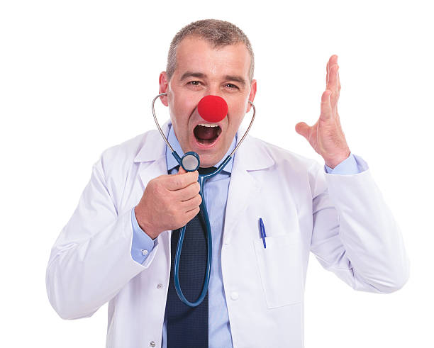 istock phony doctor screaming in his stethoscope 185852623