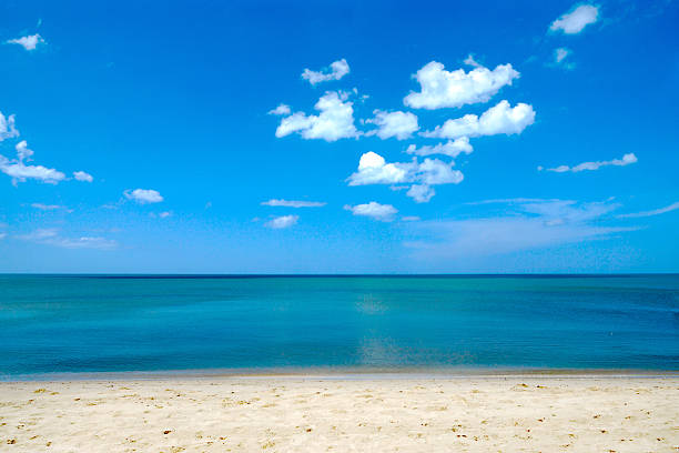 istock The beach with a blue sky and clouds. 185852900
