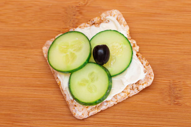 Rice Cake Sandwich with Fresh Cucumber, Cream Cheese and Olives