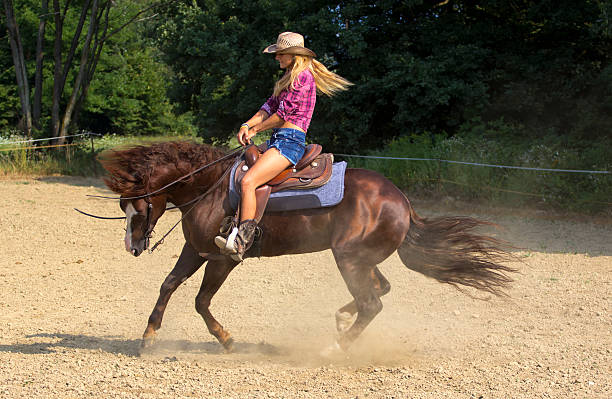 istock Cowgirl riding 185854241