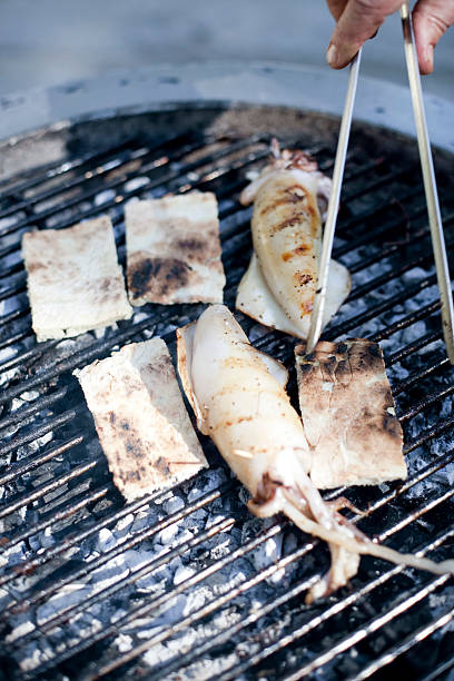 calamari and bread on the grill