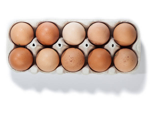 istock Box of ten brown eggs, isolated 185855951