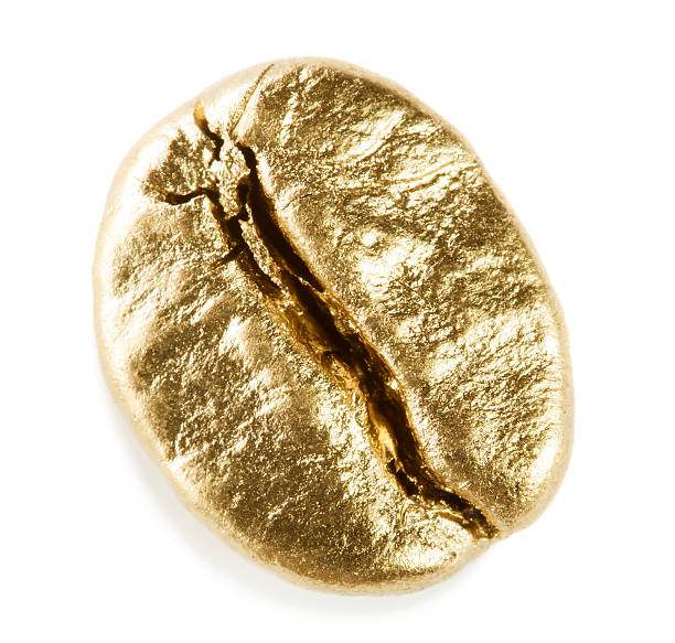 Gold coffee bean stock photo