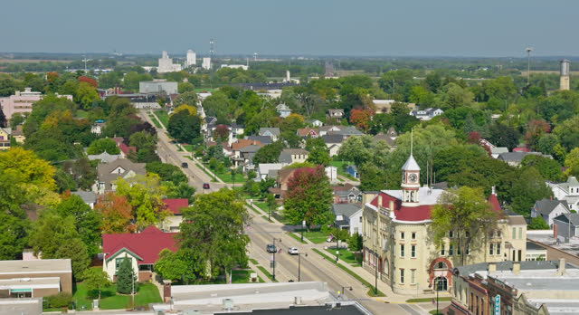 Rightward Aerial Shot of Small Town in Wisconsin on Clear Day