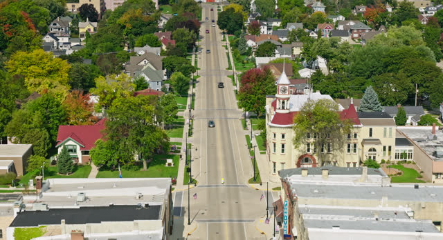 Forward Drone Flight over State Road in Small Town in Wisconsin on Clear Day