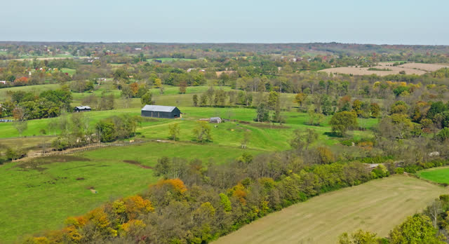 Aerial Shot of Lone Farmhouse and Barn near Georgetown, Scott County, Kentucky