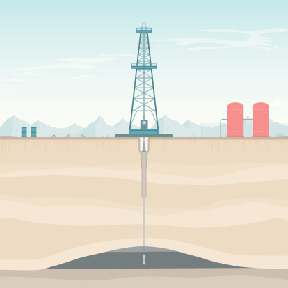 A diagram of an oil rig extracting crude oil from below the earth's surface.