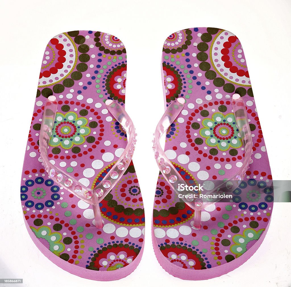 Patterned flip-flops studio photo of beach slippers - on white background Adult Stock Photo