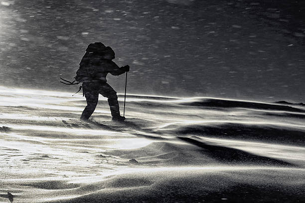 istock Climber climbing on an icy hill 185868910