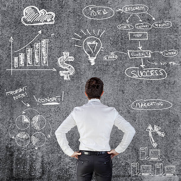 istock young businessman and business plan 185873591