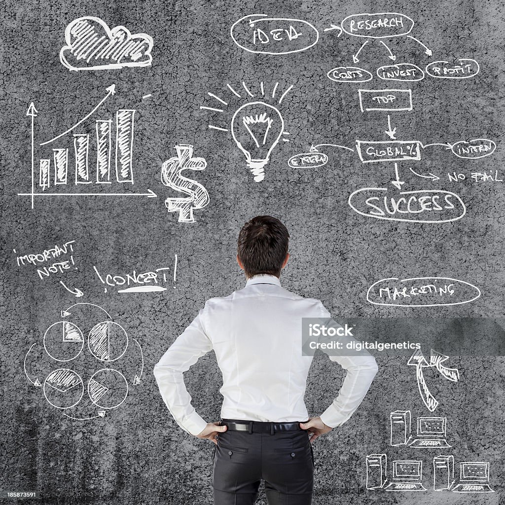 young businessman and business plan Adult Stock Photo