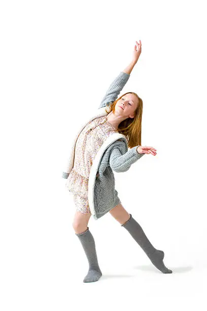 Portrait of young dancer in studio on a white background