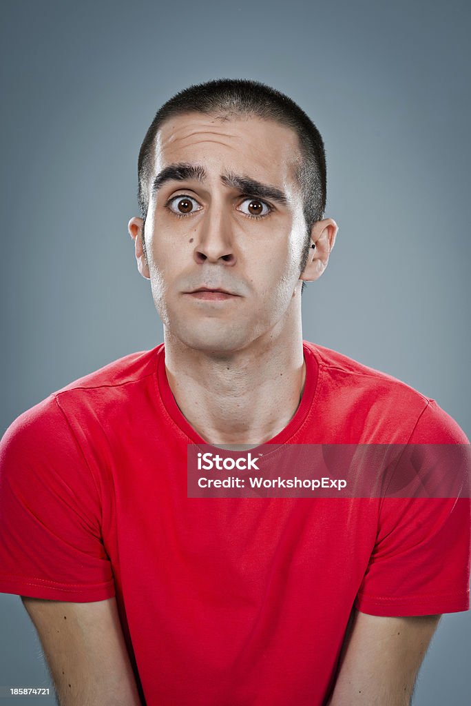 Hombre joven con miedo expresión - Foto de stock de Actitud libre de derechos