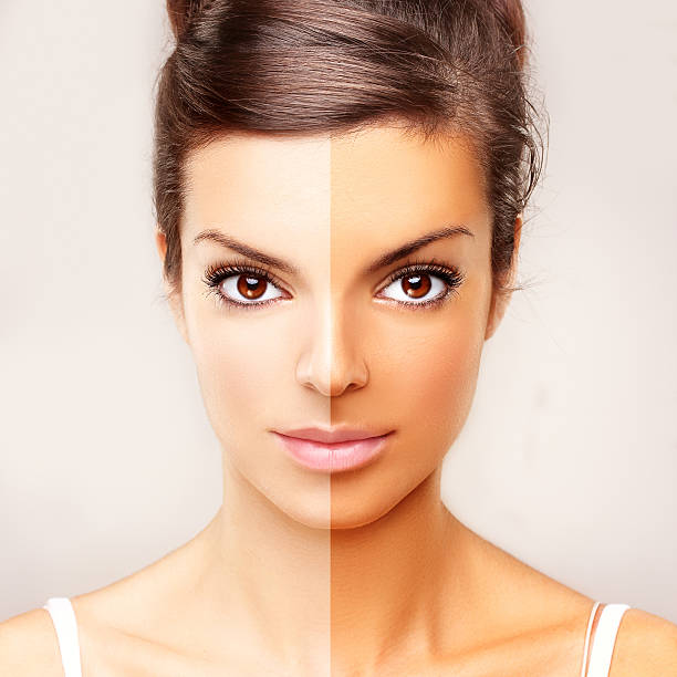 istock Model's face divided in two parts - tanned and natural. 185877067
