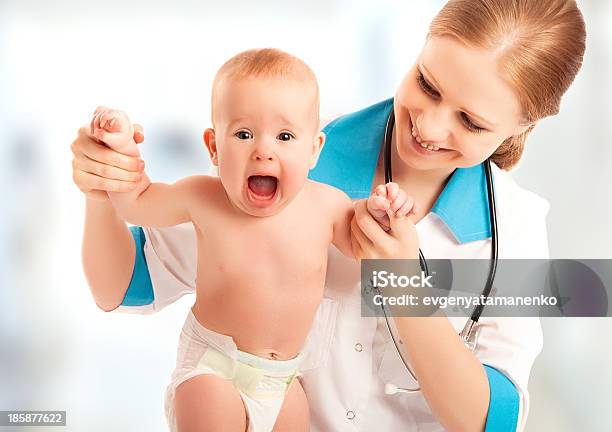 Fear Of Doctor Baby Cries Reception At Doctor Stock Photo - Download Image Now - Adult, Assistance, Baby - Human Age