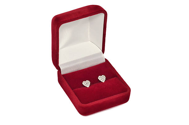 istock Diamond heart shaped earrings in red jewel box 185877838