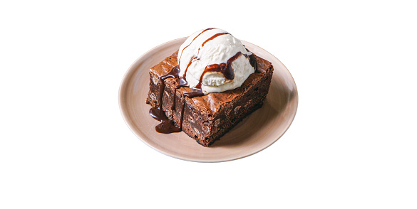 Brownies and vanilla ice cream served on a plate. Food. White background