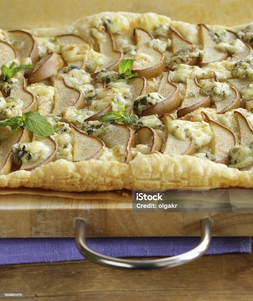 Puff pastry tart with blue cheese and pears Appetizer Stock Photo