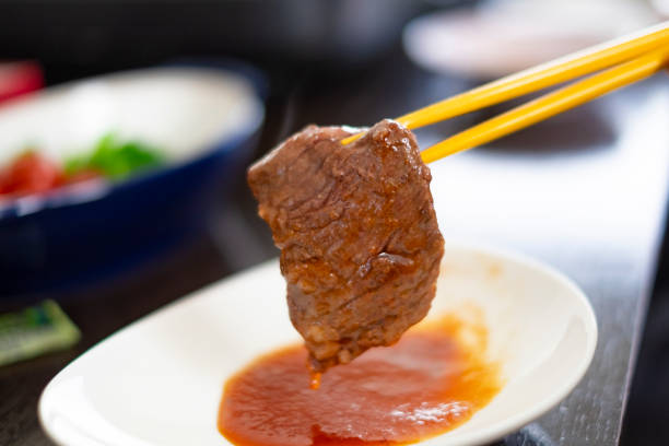 Dip the grilled meat in the sauce.