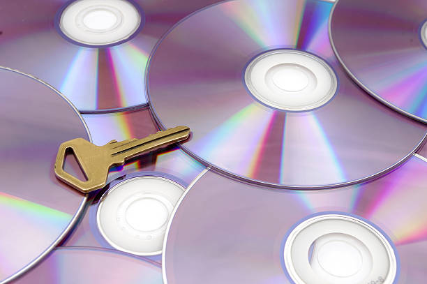 Keys and CD-ROM stock photo