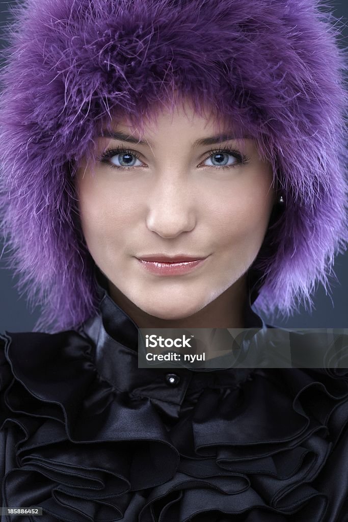 Happy beauty in purple wig Closeup portrait of happy beauty smiling in funny purple wig.. 20-24 Years Stock Photo