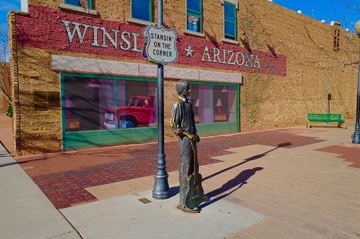 Winslow, Arizona: 12/15/2023- A street corner on historic Route 66 made.famous by the song Take It Easy by the Eagles in the 1970’s.