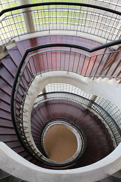 istock Upside view of a spiral staircase 185891024