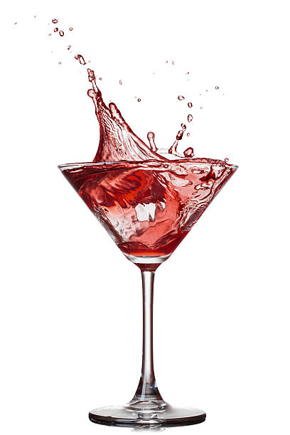 istock Red cocktail with splash isolated on white 185893863