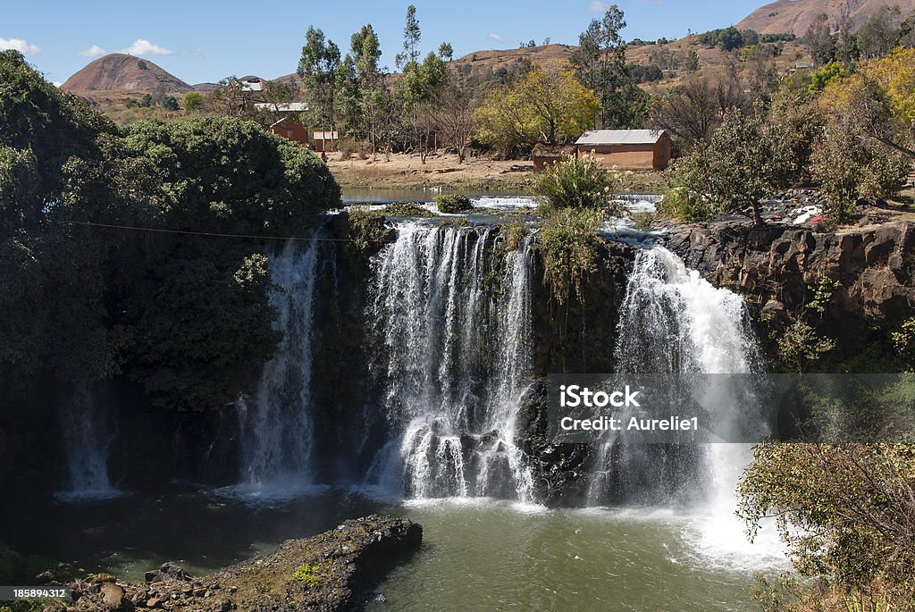 Lily waterfall The river and waterfall is named for a little girl Lily, who disappeared in the water. It is situated in the village of Antafofo, near Ampefy, Madagascar Backgrounds Stock Photo