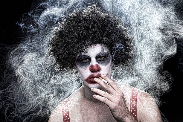 istock Smoking Evil Spooky Clown Portrait 185895235