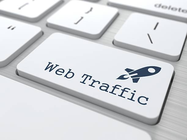 Web traffic keyboard button with rocket stock photo