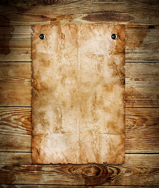 istock Old paper on the wood background 185896245