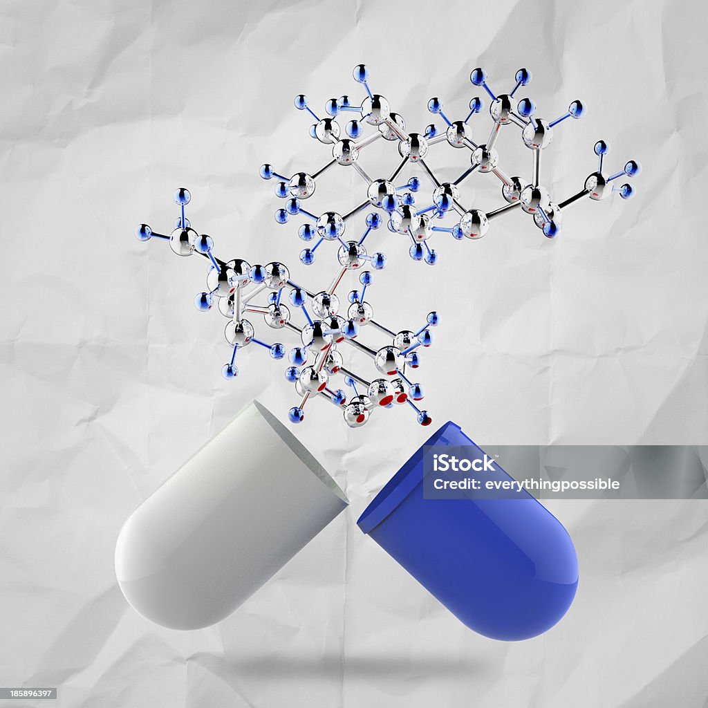 green medical capsule and molecule structure on crumpled paper a green medical capsule and molecule structure on crumpled paper as concept Addiction Stock Photo